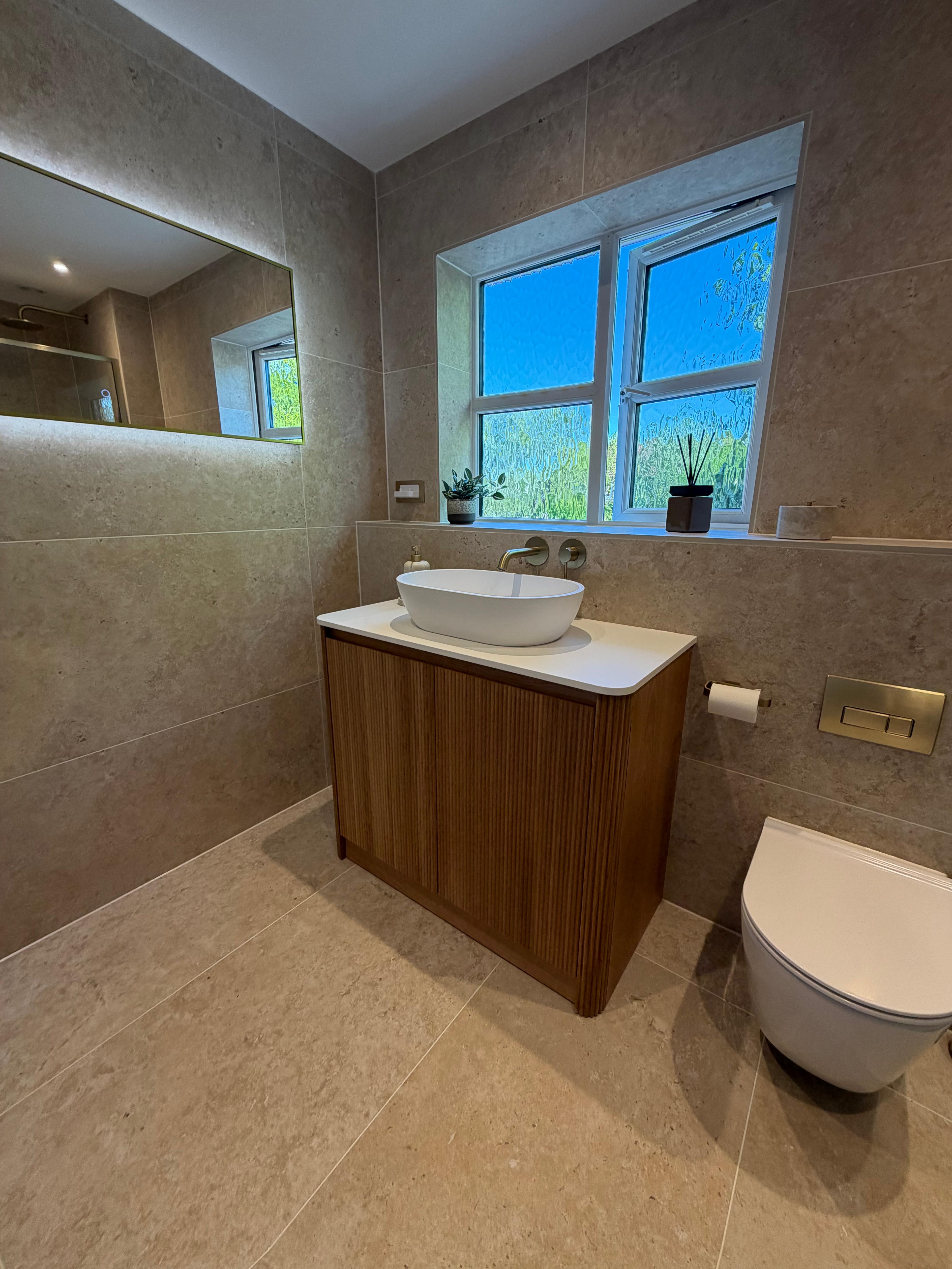 Stone-Effect Family Bathroom — completed by Chelmsford Plumbing Services Ltd