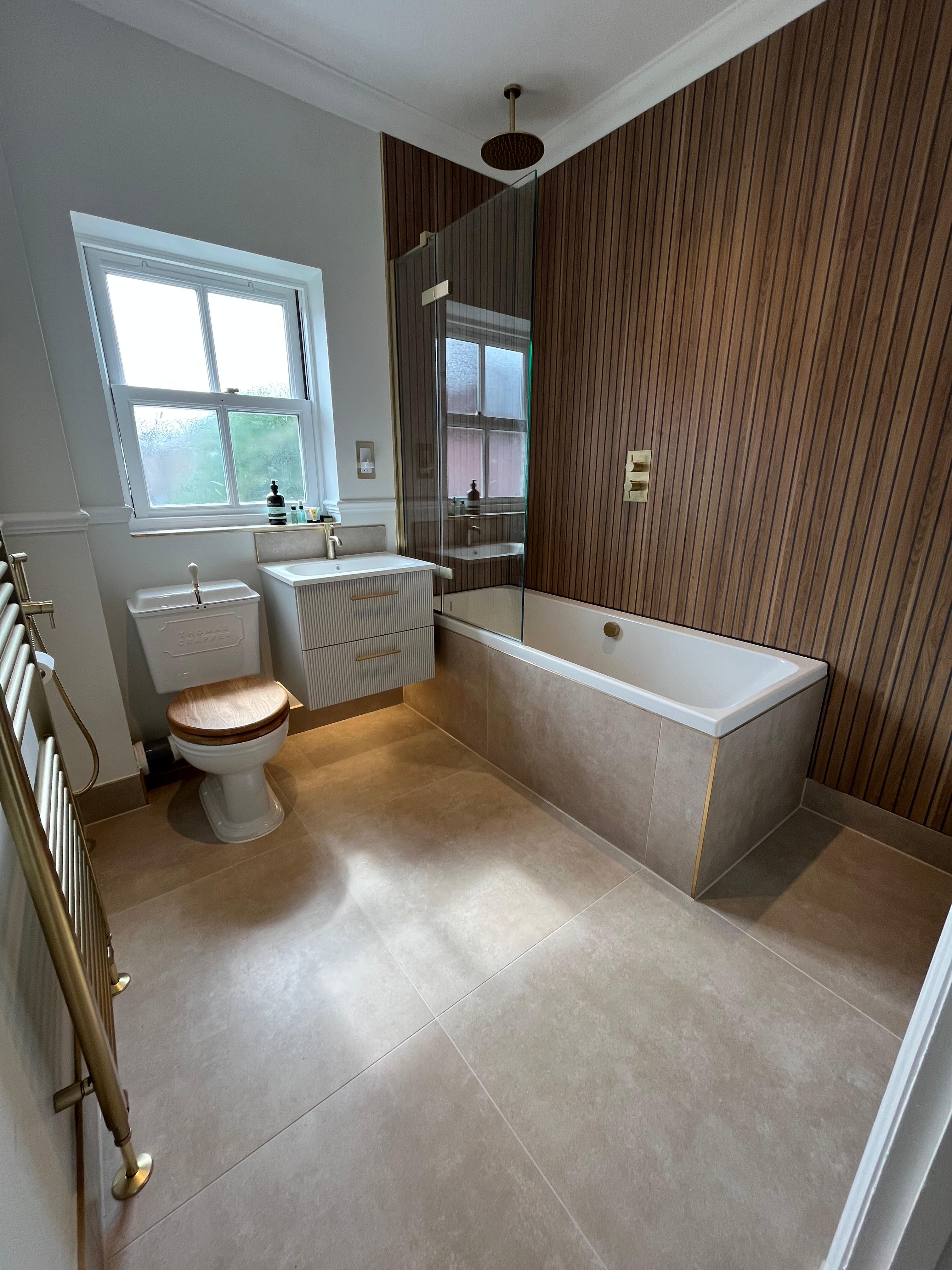 Walnut Feature Bathroom — completed by Chelmsford Plumbing Services Ltd